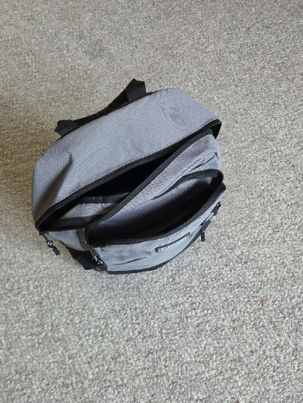 NWOT Eastsport Gray Backpack with Multiple Pockets